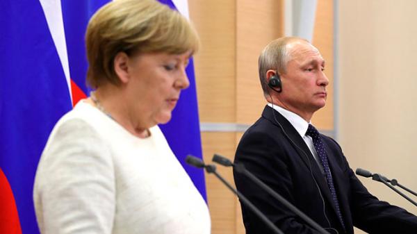 Путин и Меркель обсудили урегулирование конфликта на Донбассе